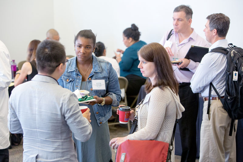 Faculty networking at event